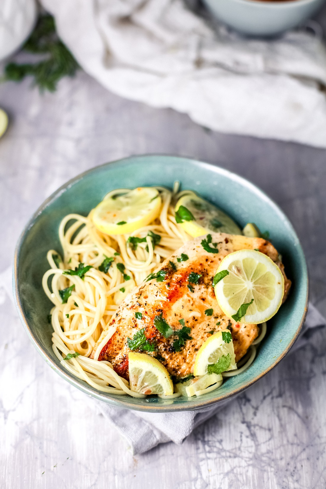 Lemony Chicken Francaise over pasta 
