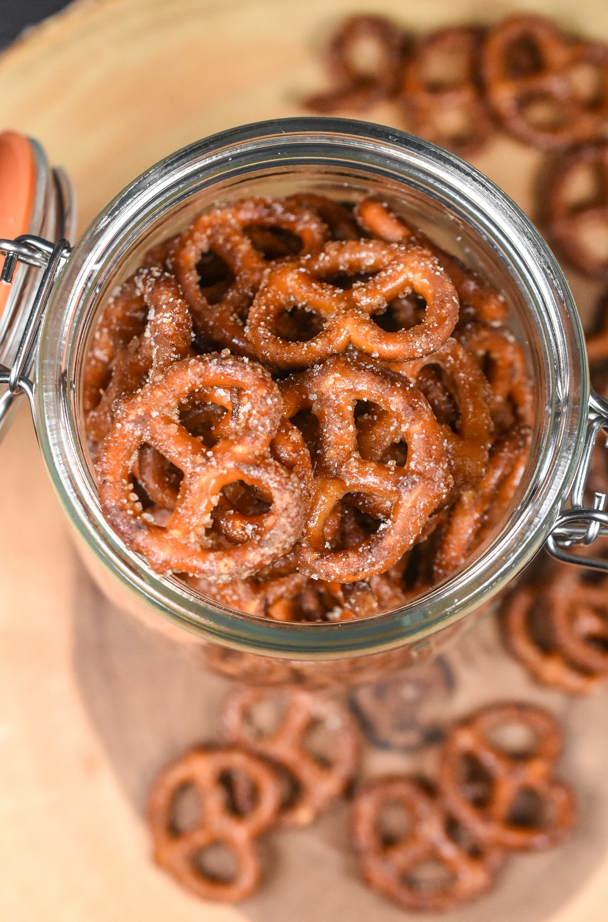 tter Toffee Pretzels in a large glass jar, with lid open, coated with brown sugar and butter. Delicious!