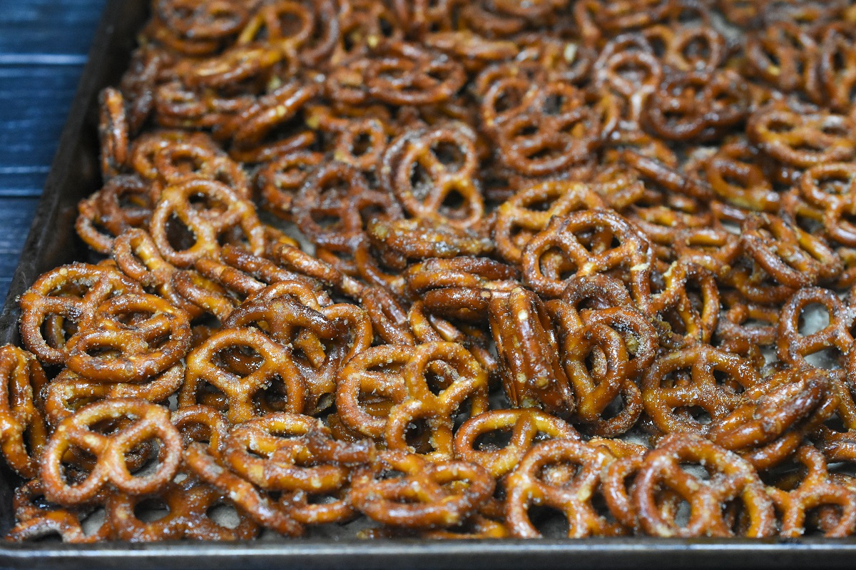 Butter Toffee Pretzels on a cbaking sheet hot from the oven.