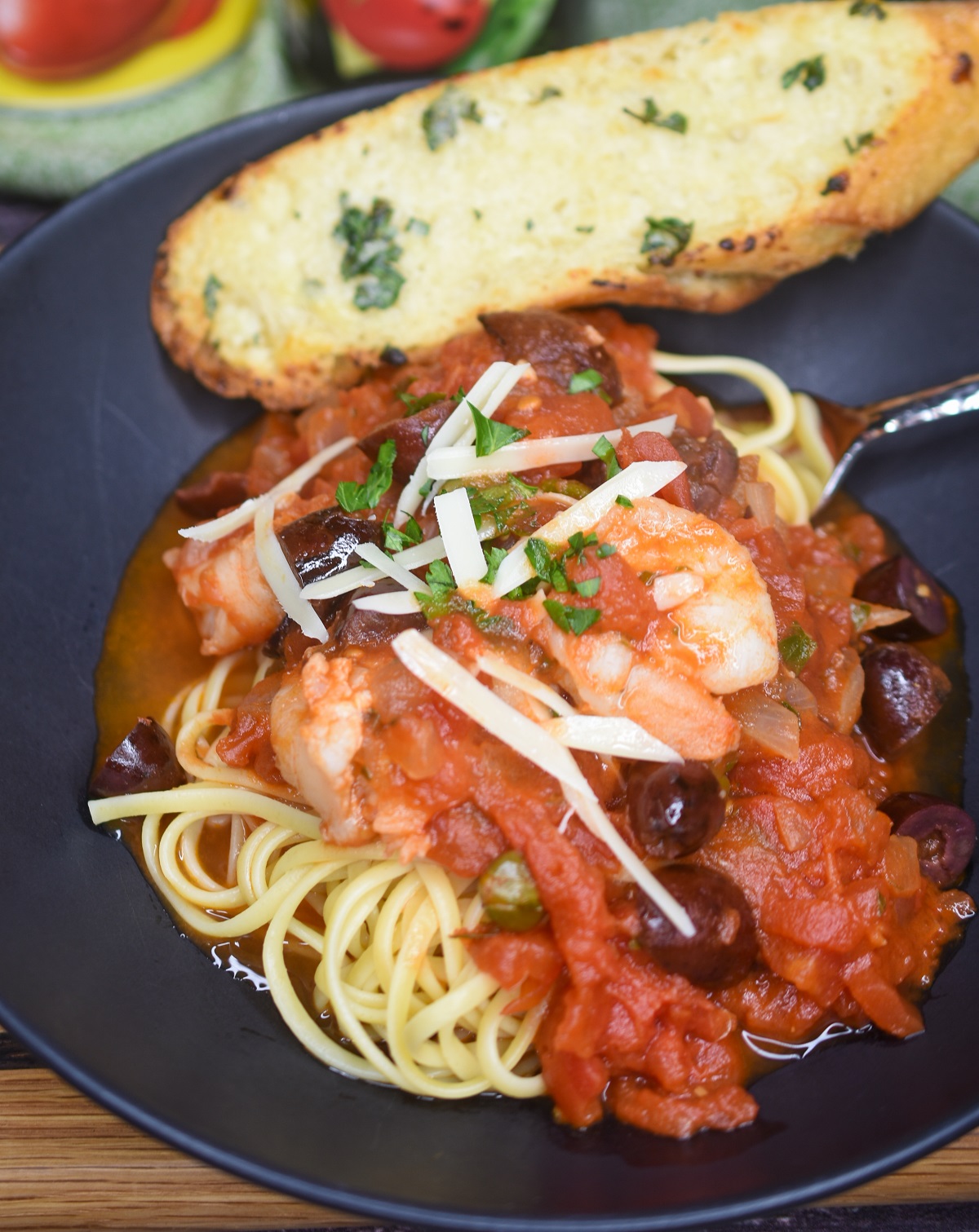 Puttanesca sauce with shrimp over linguini 