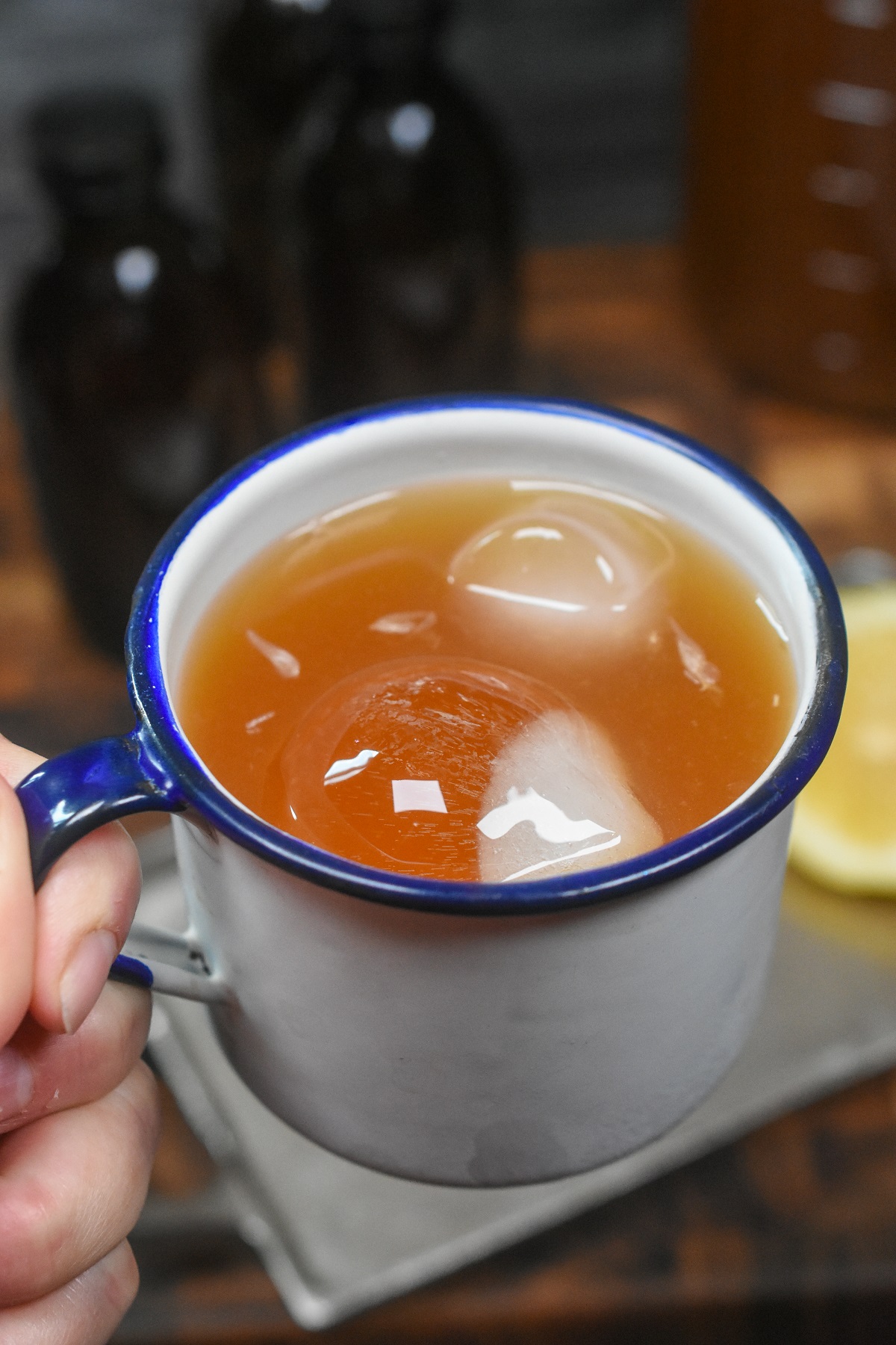 Vintage enamel cup filled with Philadelphia Fish House Punch