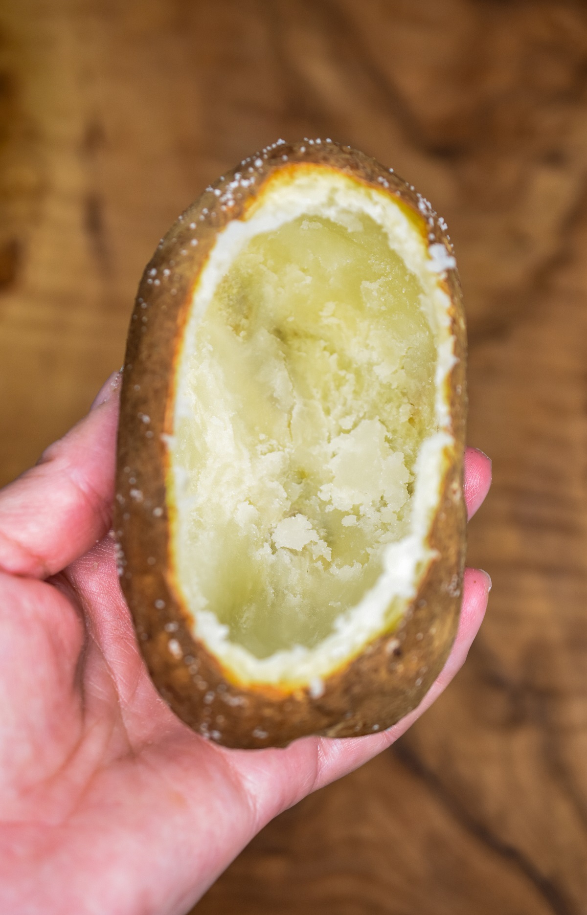 Baked potato that's been scooped out for making a twice baked potato.