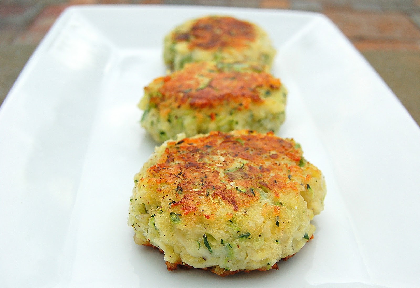 Zucchini Parmesan Cakes - A delicious way to use up all that summer zucchini!