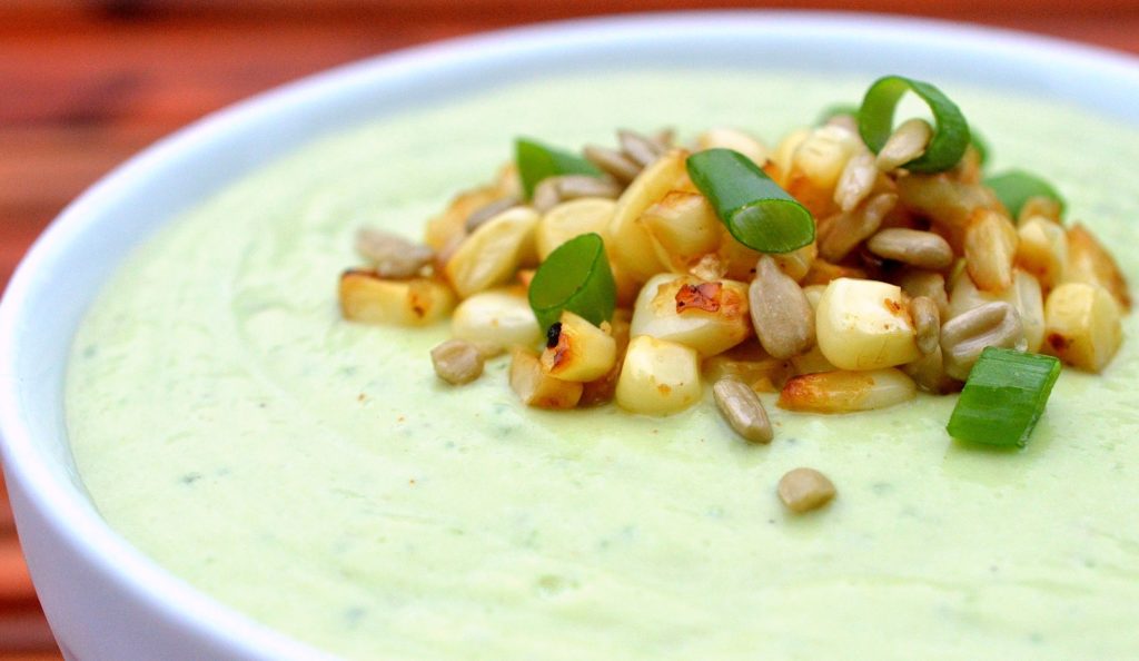 Spicy Avocado Cucumber Soup with Roasted Corn & Sesame Seeds by Souffle Bombay