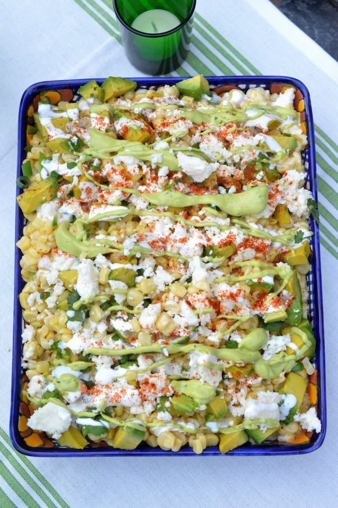 Mexican Street Corn Salad feautring avocados Cojita cheese, Mexican table cream & a Spicy Creamy Guacamole Dip Drizzle