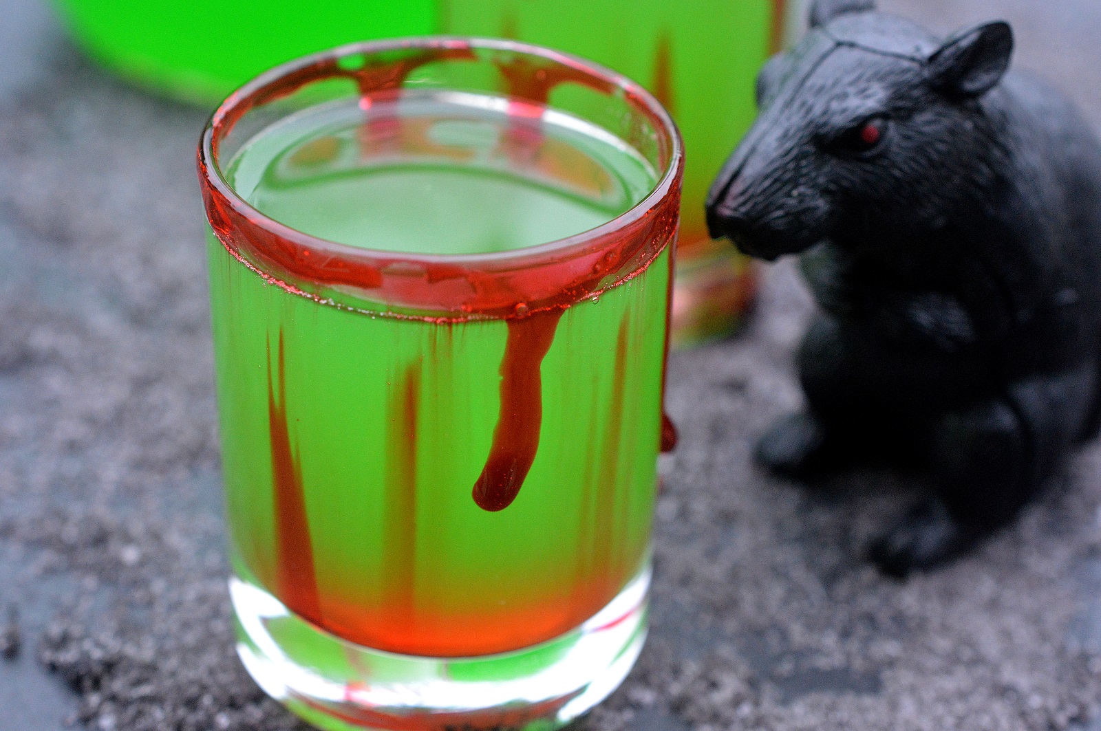 Halloween Party Recipe  Halloween Cocktail recipe Green Halloween Drink with fake blood on the rim