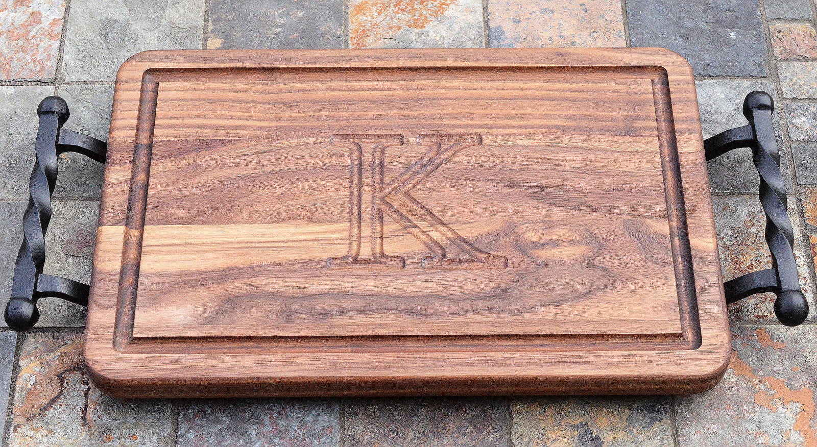 Walnut Wood Twisted Iron Monogramed Cutting Board made in the USA from www.cuttingboard.com