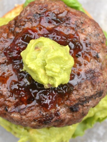 Guacamole Burgers. Creamy guac and the sweet & spicy kick of hot pepper jelly make these dairy-free burgers irresistible!