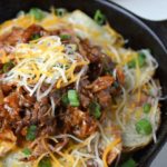 Pulled Pork Potato Nachos are a flavor explosion and a great gluten free offering!