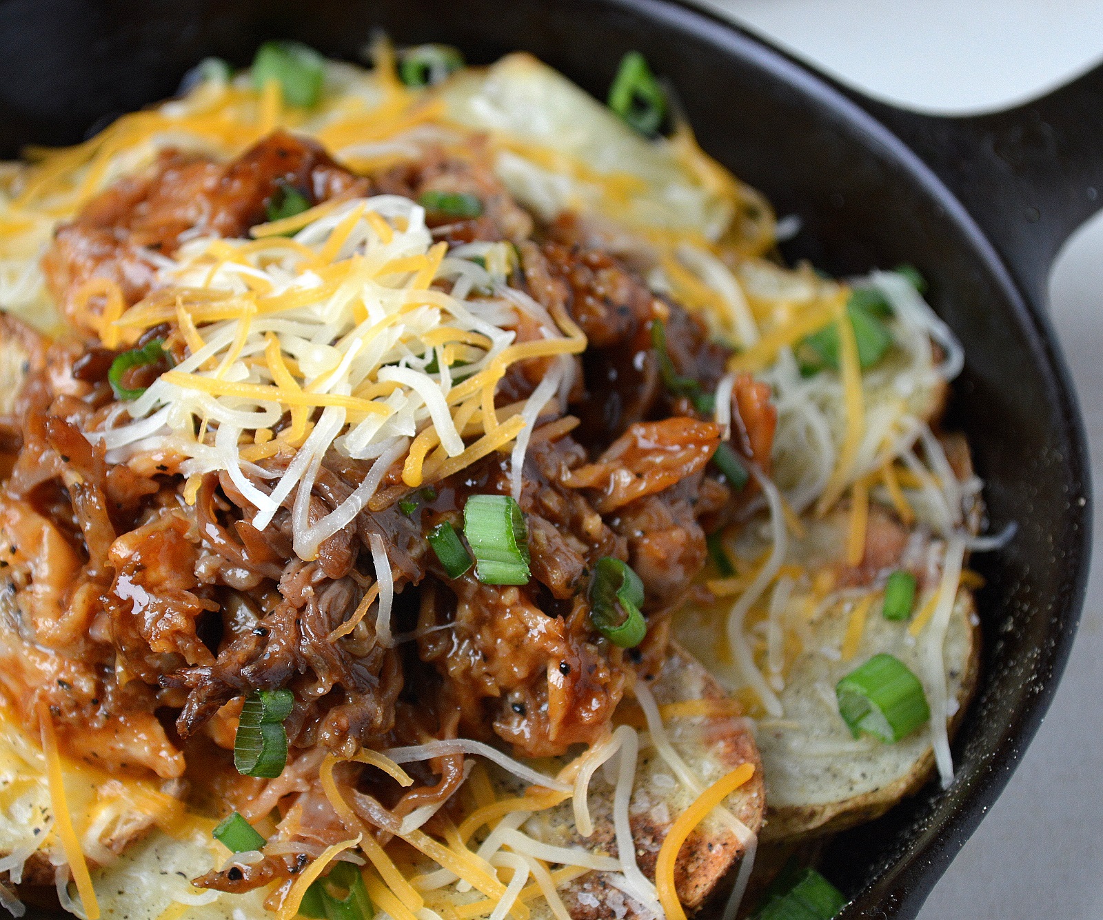 Pulled Pork Potato Nachos are a flavor explosion and a great gluten free offering!