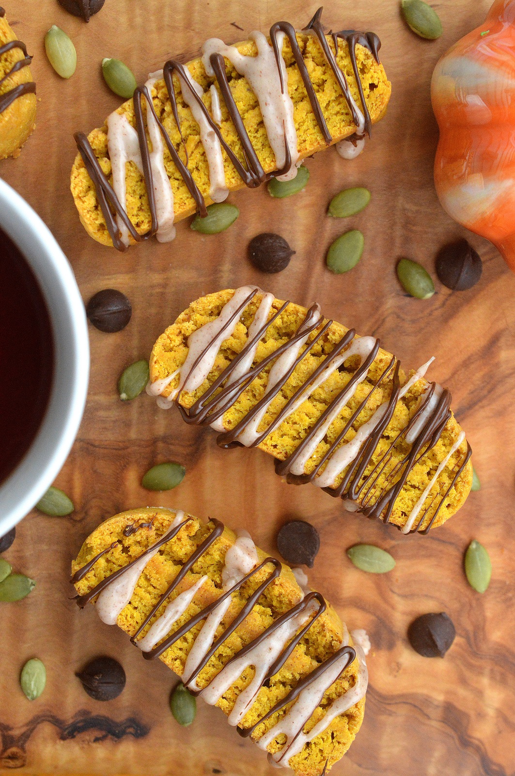 Delicious Pumpkin Biscotti Recipe drizzled with Cinnamon Glaze and Dark Chocolate, mmmmm!