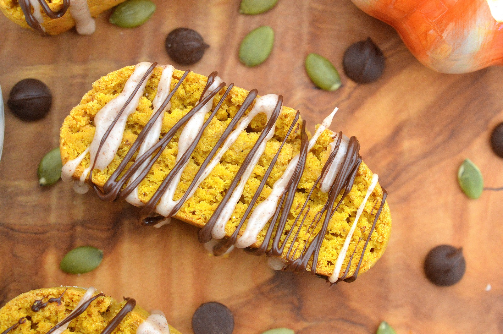 Delicious Pumpkin Biscotti Recipe drizzles with Cinnamon Glaze and Dark Chocolate, mmmmm!