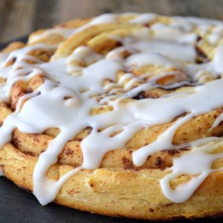 Giant Cinnamon Bun Cake! It's fun, moist & delicious and all you need is a can of Pillsbury Grands Cinnamon Buns!