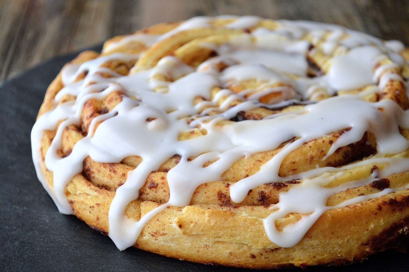 Giant Cinnamon Bun Cake! It's fun, moist & delicious and all you need is a can of Pillsbury Grands Cinnamon Buns!