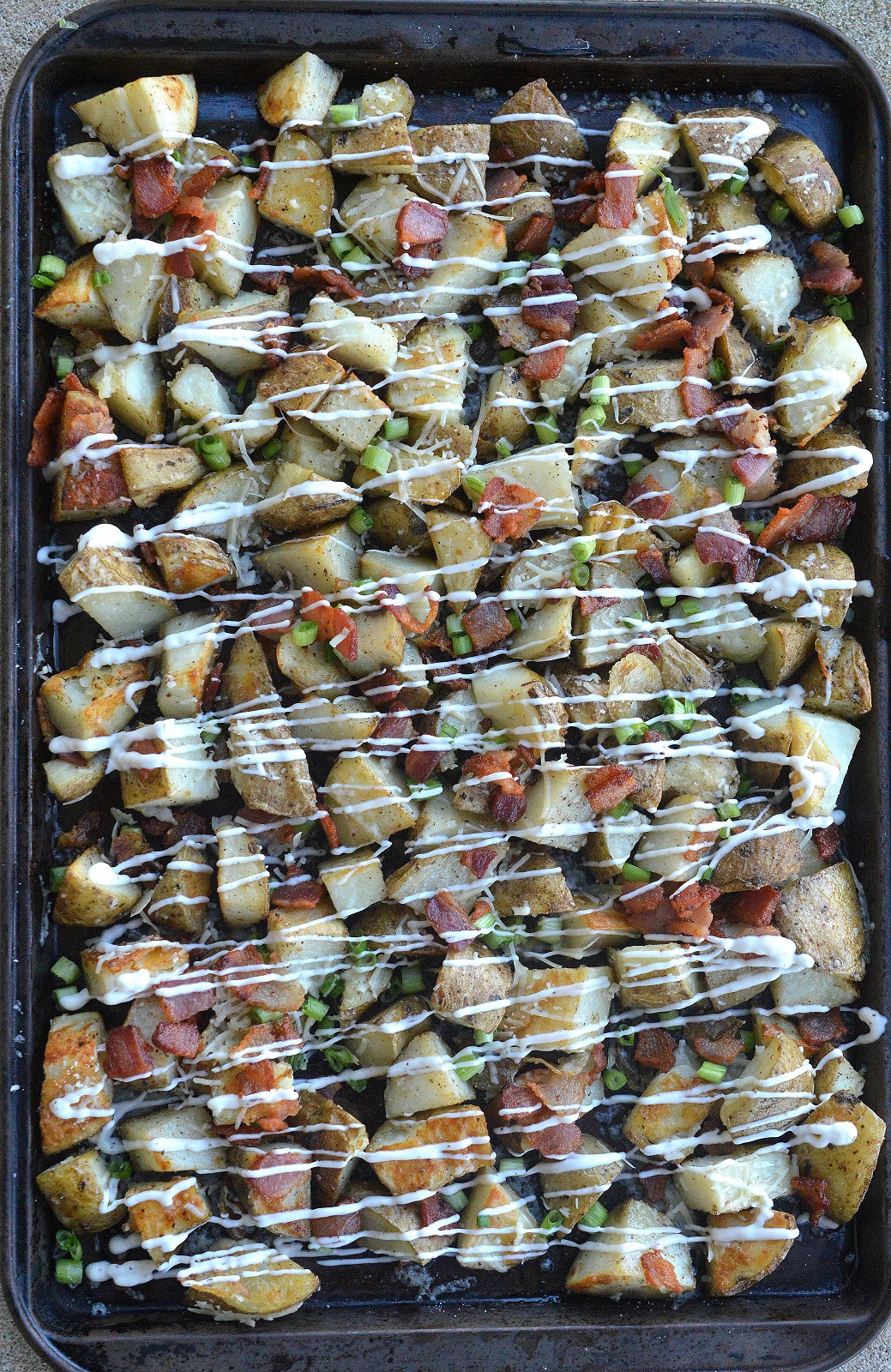 Loaded Sheet Pan Roasted Potatoes are easy and always a hit!