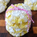 Easy Lemon Crinkle Cookies recipe. A delicious lemon cookie recipe Showl 3 cookies stacked atop one another tied with pink and white bakery string