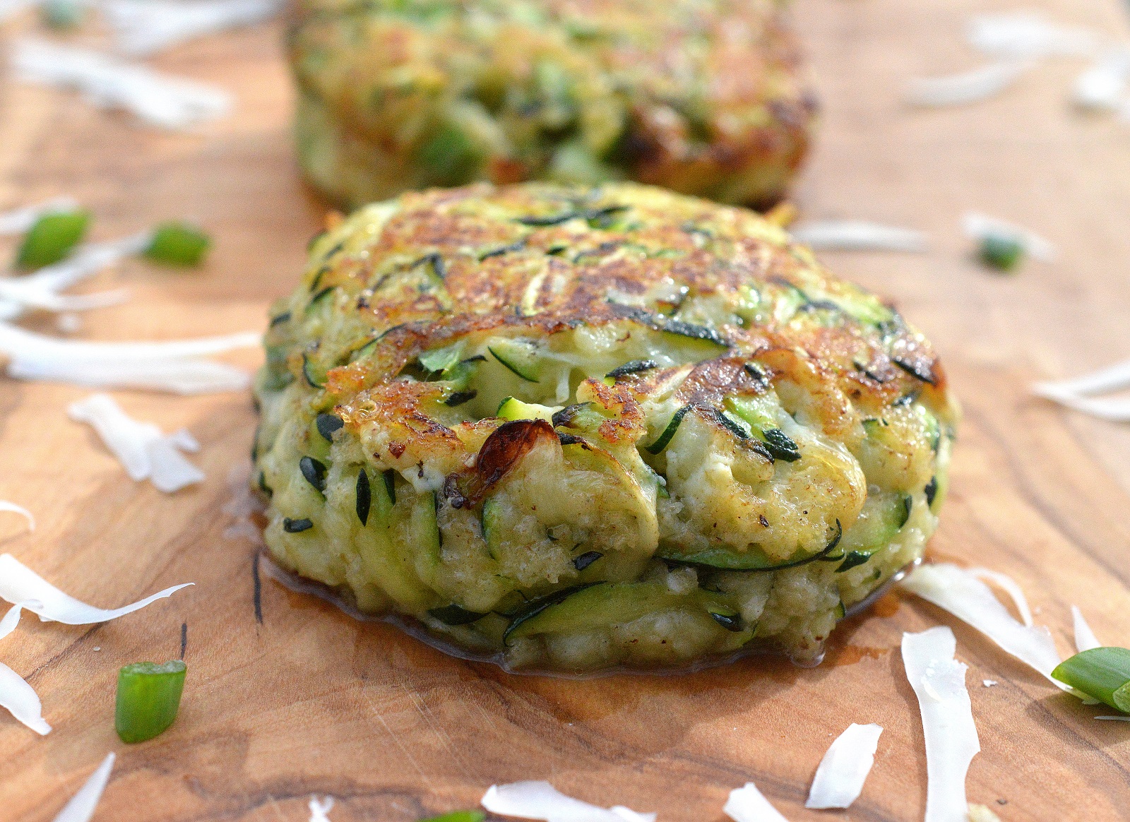 These Cheesy Zucchini Cakes are different and delicious! Plus they are low carb and keto friendly!