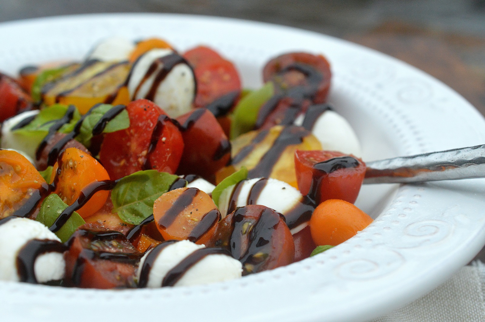 Liven up your Caprese Salad with colorful artisan or heirloom tomatoes