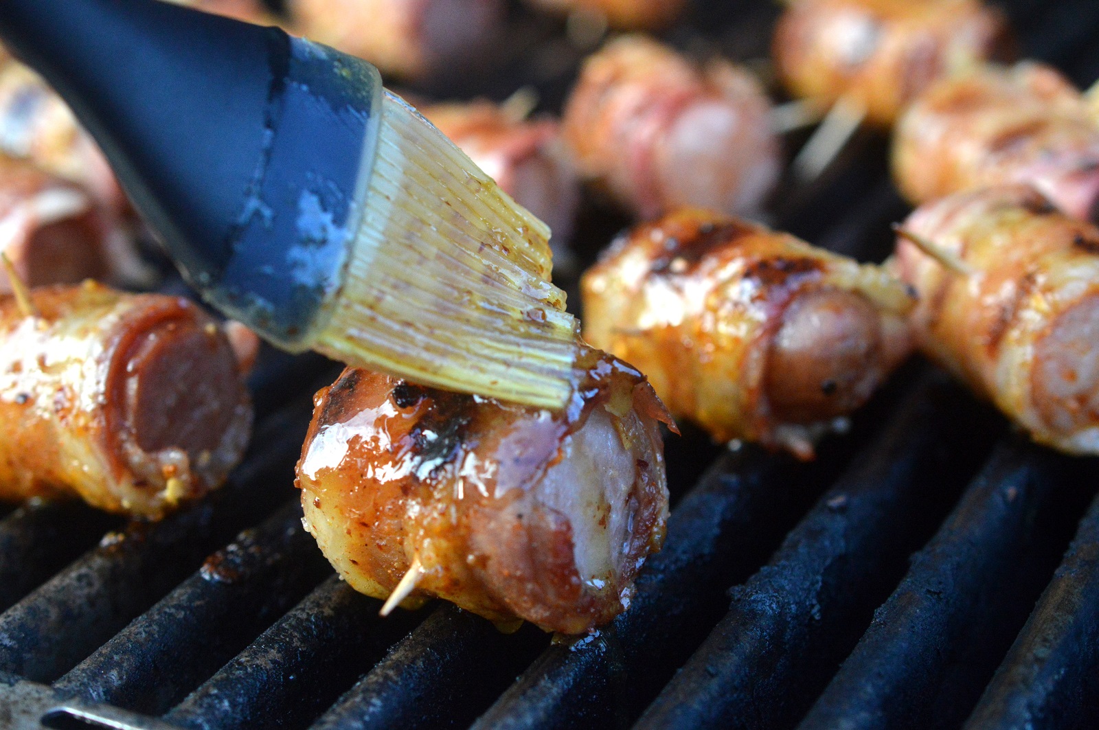 Brushing with Glaze the appetizer on the grill