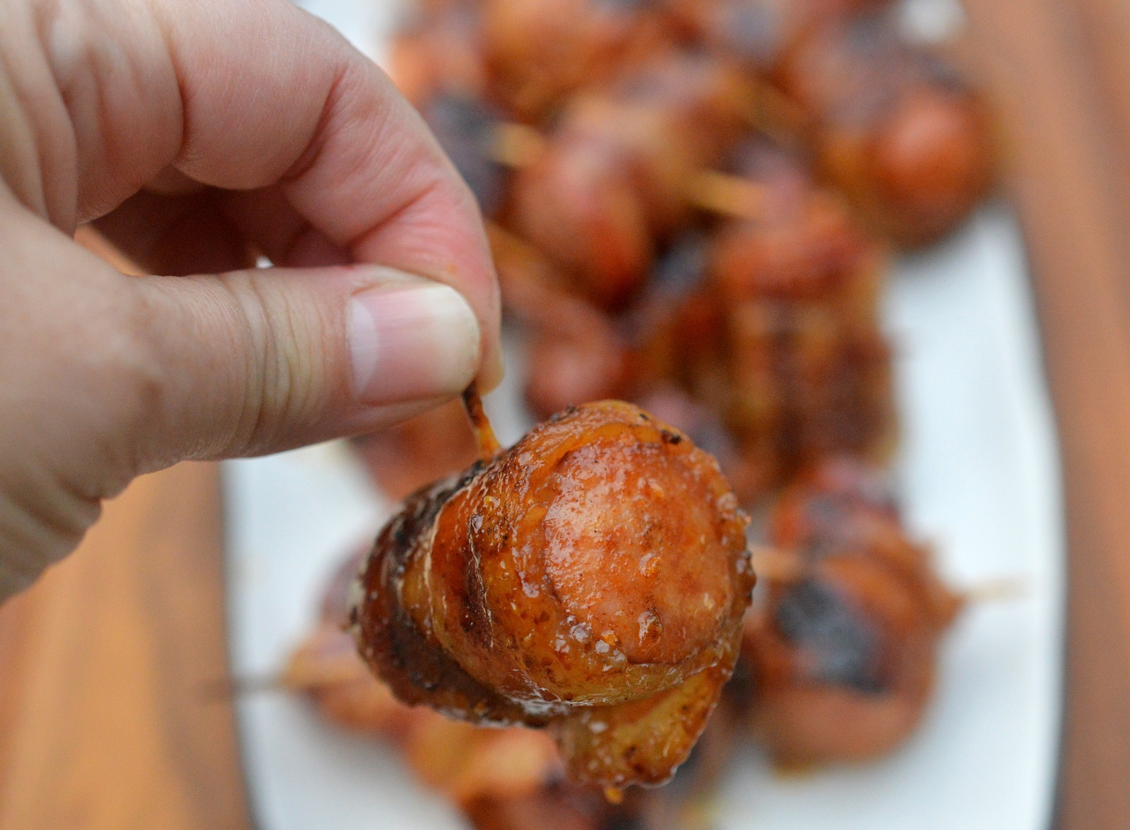 Glazed Bacon Wrapped Sausage Bites perfect appetizer on the grill for tailgating