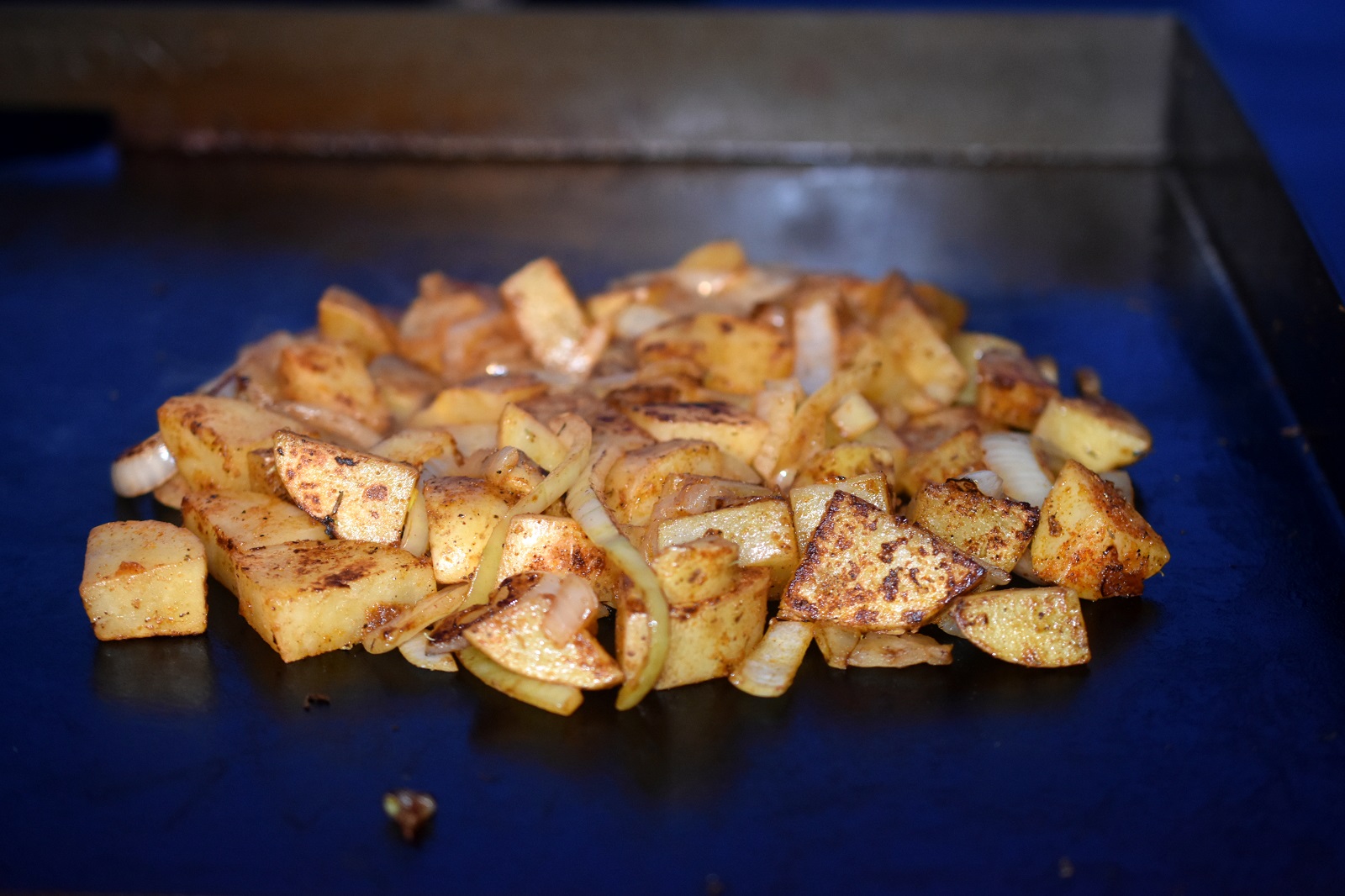 Potatoes cooked on Blackstone Griddle with Homemade Steak Seasoning