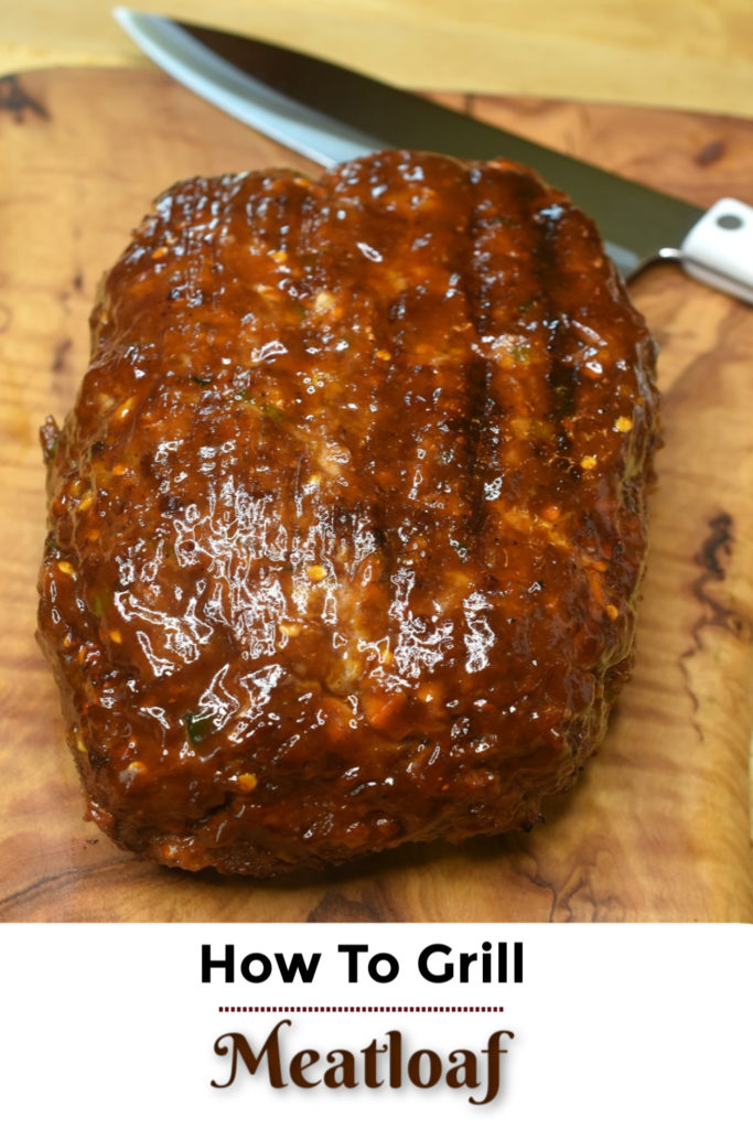 Image of a whole meatloaf ready to eat that was cooked on the grill
