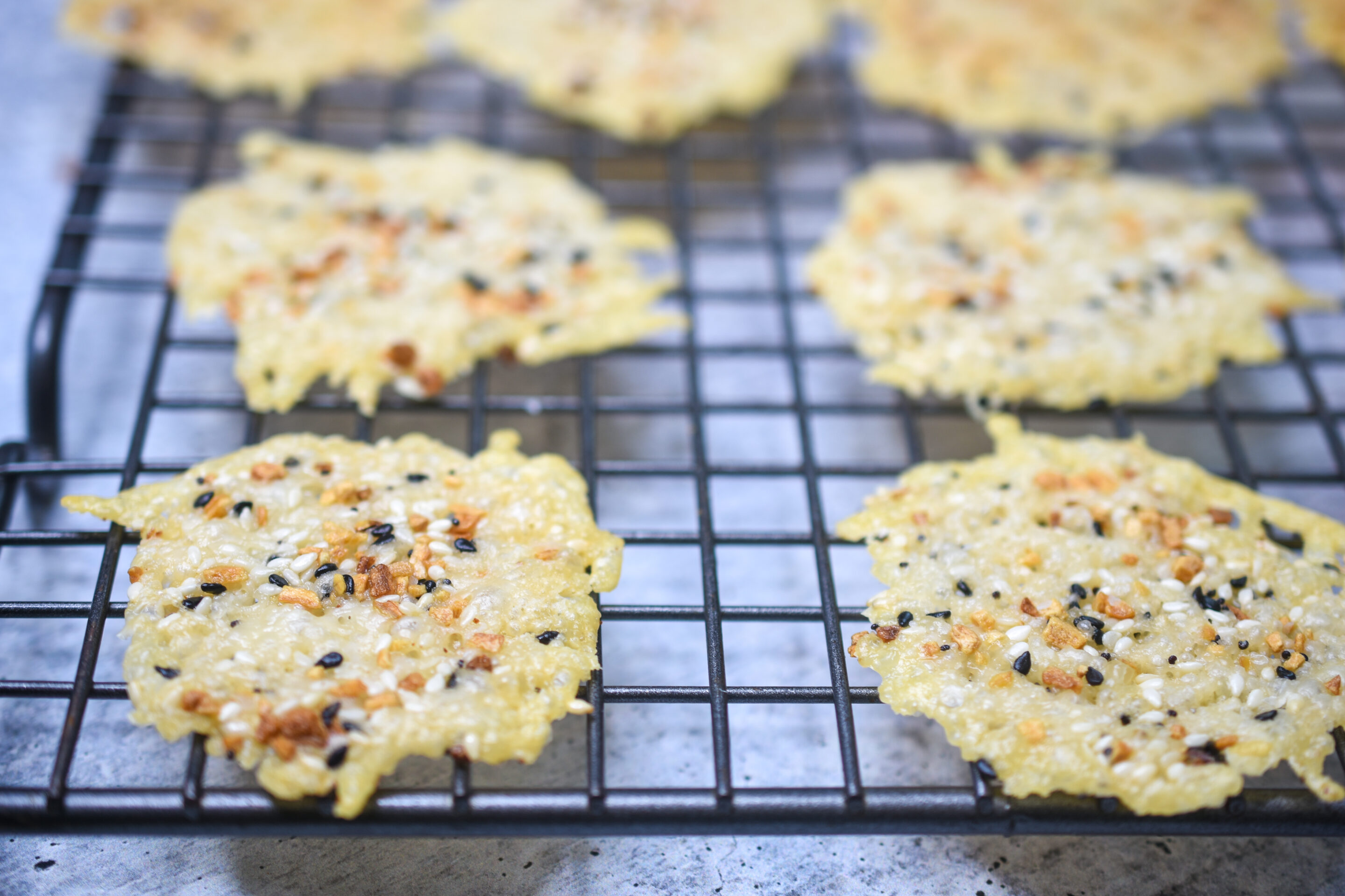 Parmesan Cheese Crisps Recipe shown on a cooling rack