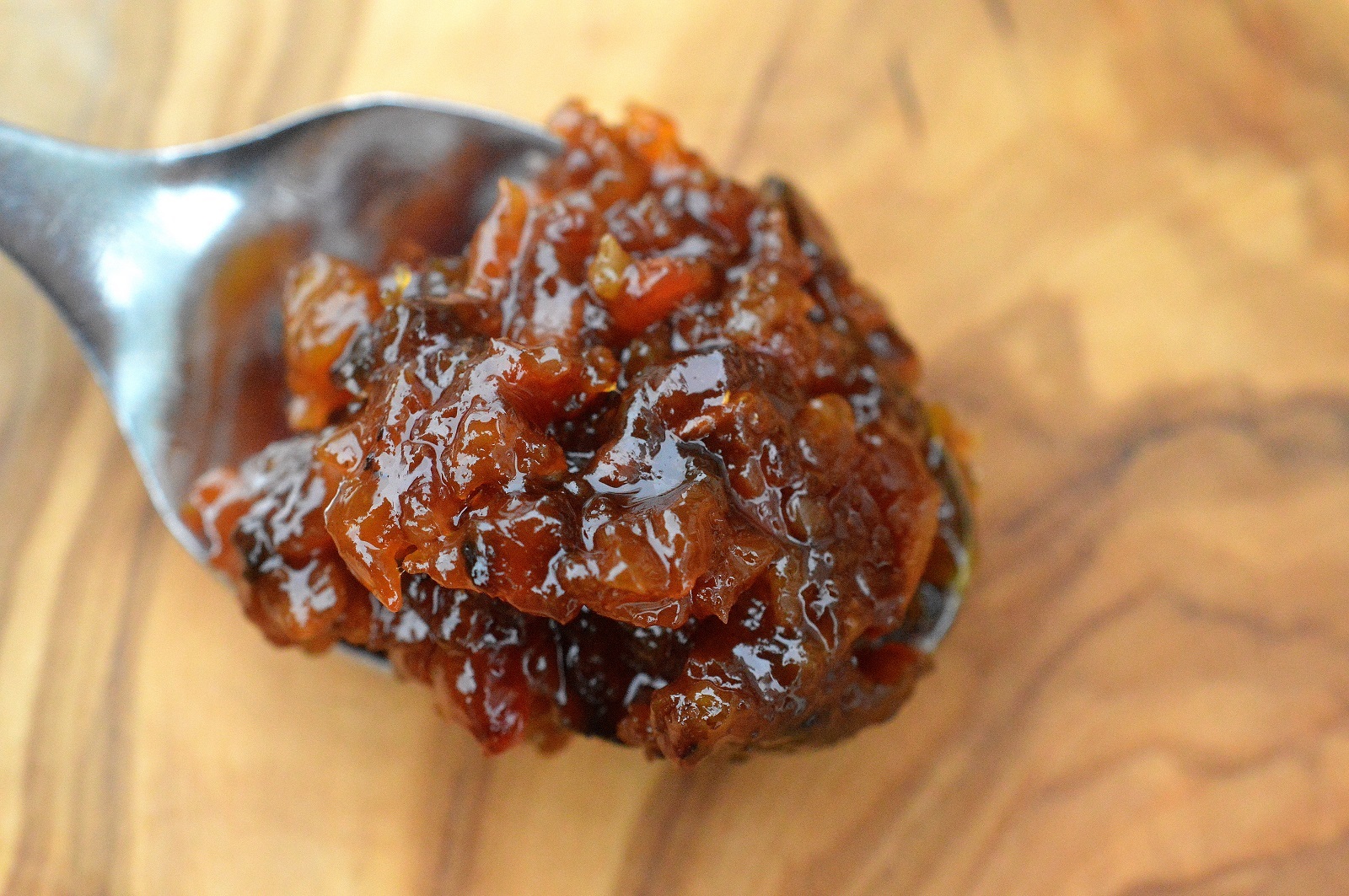 Bacon jam on a spoon for bacon jam burgers