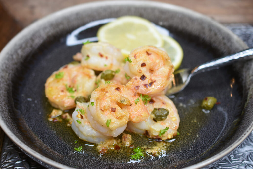 Lemon Garlic Shrimp Recipe ready in 10 minutes or les and always a crowd pleaser!!
