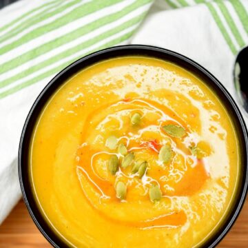 Pumpkin Soup in bowl with pepita garnish