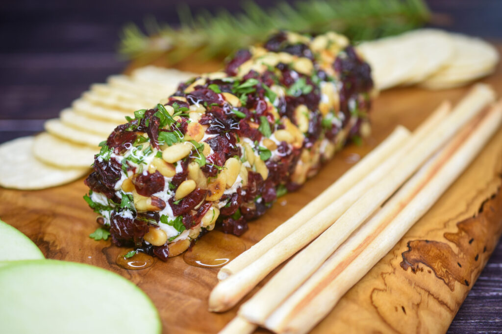 Holiday Goat Cheese Appetizer. Simple but spectacular! Cranberry & nut encrusted goat cheese log