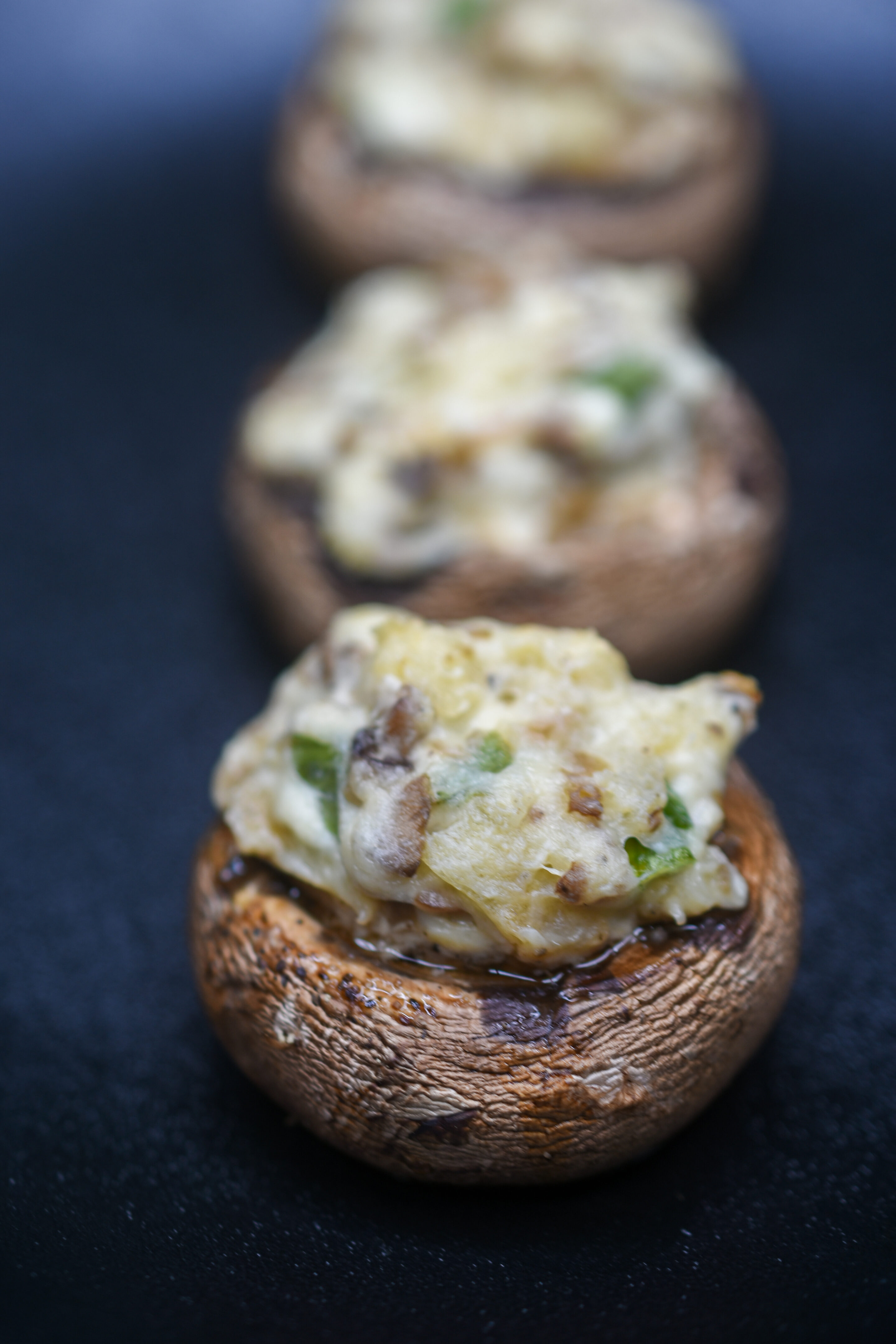 Easy Stuffed Mushrooms Recipe made either vegetarian or with sausage.
