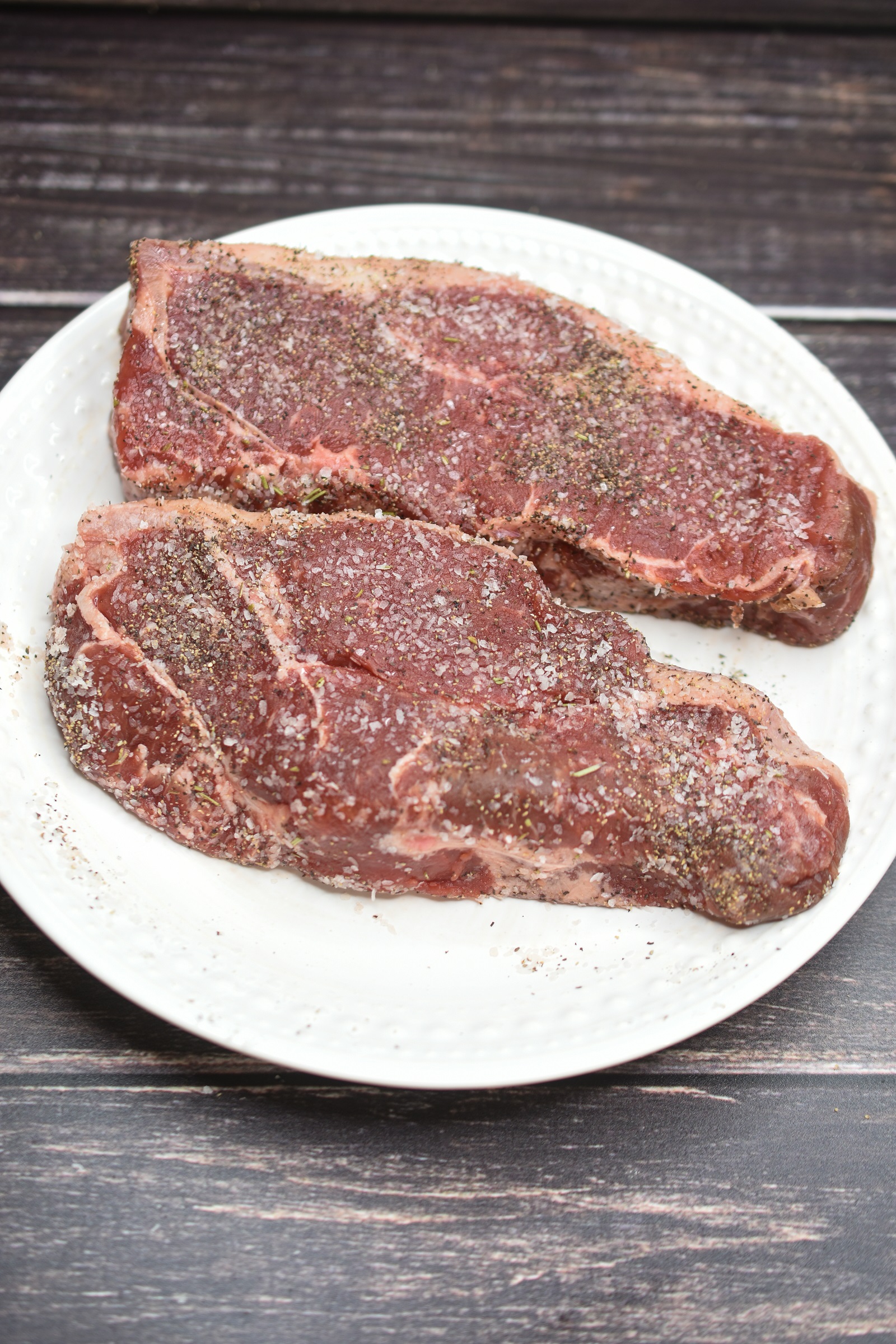 How to cook Bison Steaks ingredients Bison ribeye steaks, kosher salt and black pepper. Butter for the pan and optional herbs.