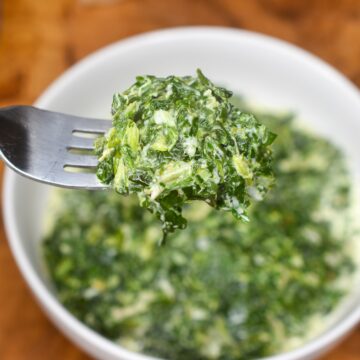 This easy Steakhouse Creamed Spinach Recipe has great flavor. It's both a keto creamed spinach recipe and gluten free creamed spinach recipe.