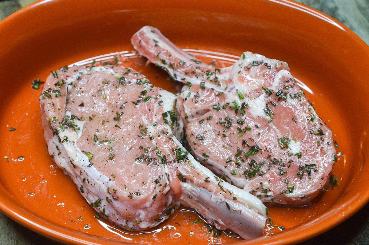 Delicious Pan Fried Veal Chops in a White Wine Sauce. 
Prepping veal chops for cooking.