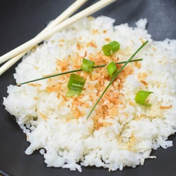 Coconut Rice topped with toasted coconut. Also called Arroz con Coco