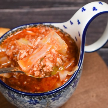 Unstuffed Cabbage Soup Recipe also called Golumpki Soup shown in a Polish Pottery Soup Bowl