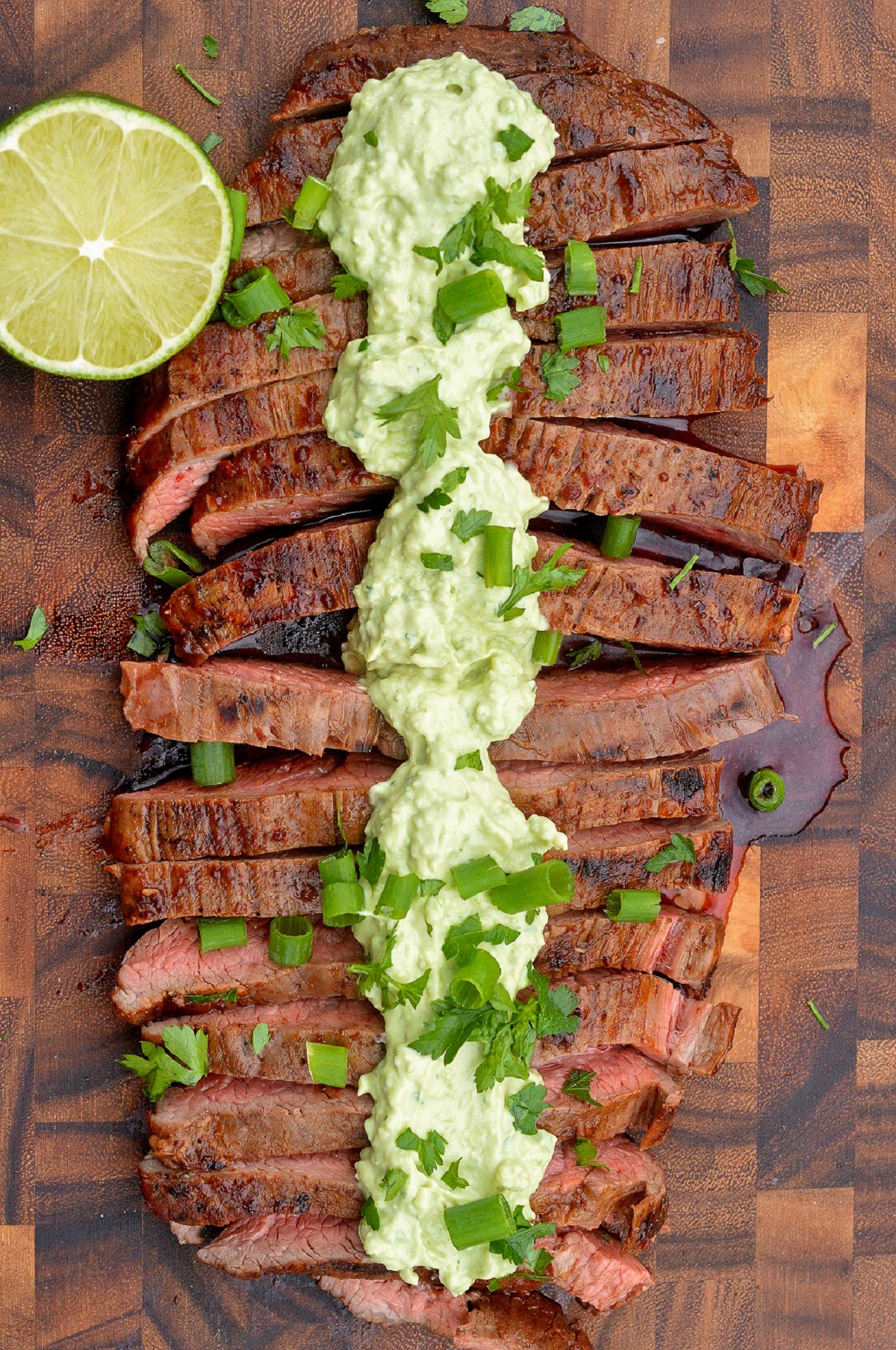 Avocado Crema over sliced grilled steak