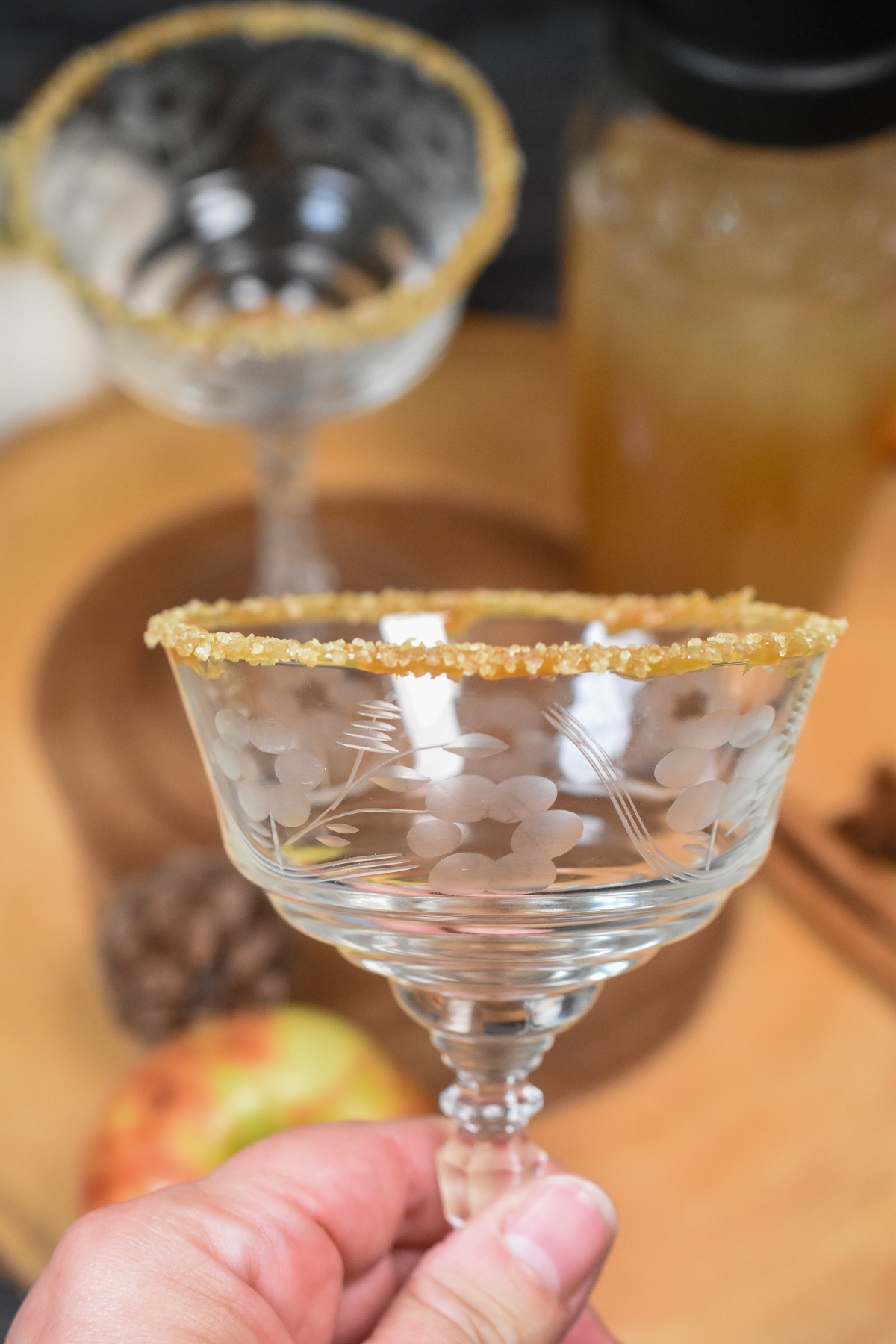 Vintage coupe glass rimmed with caramel and sugar for Apple Cider Martinis