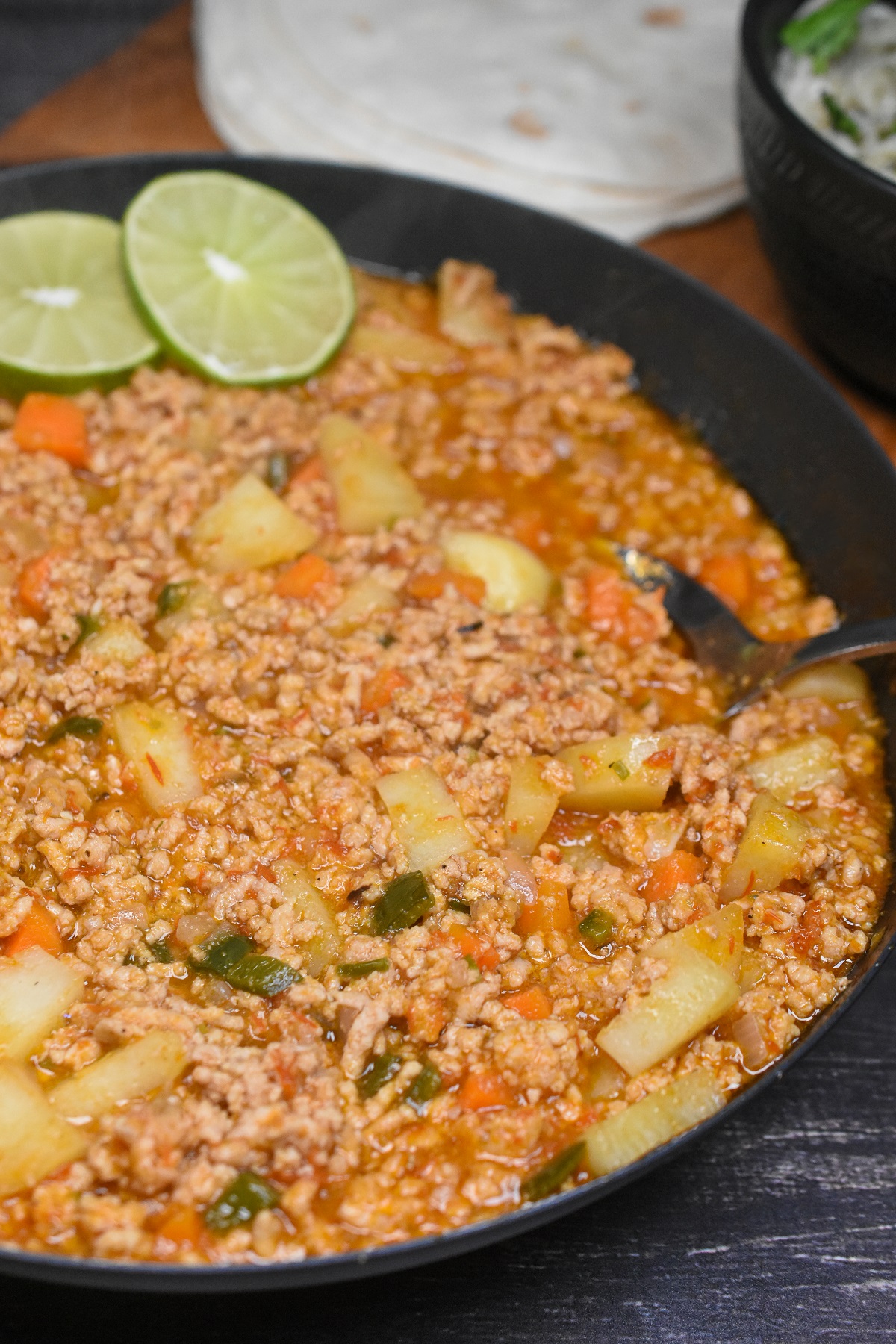 Picadillo made in a cast iron pan.