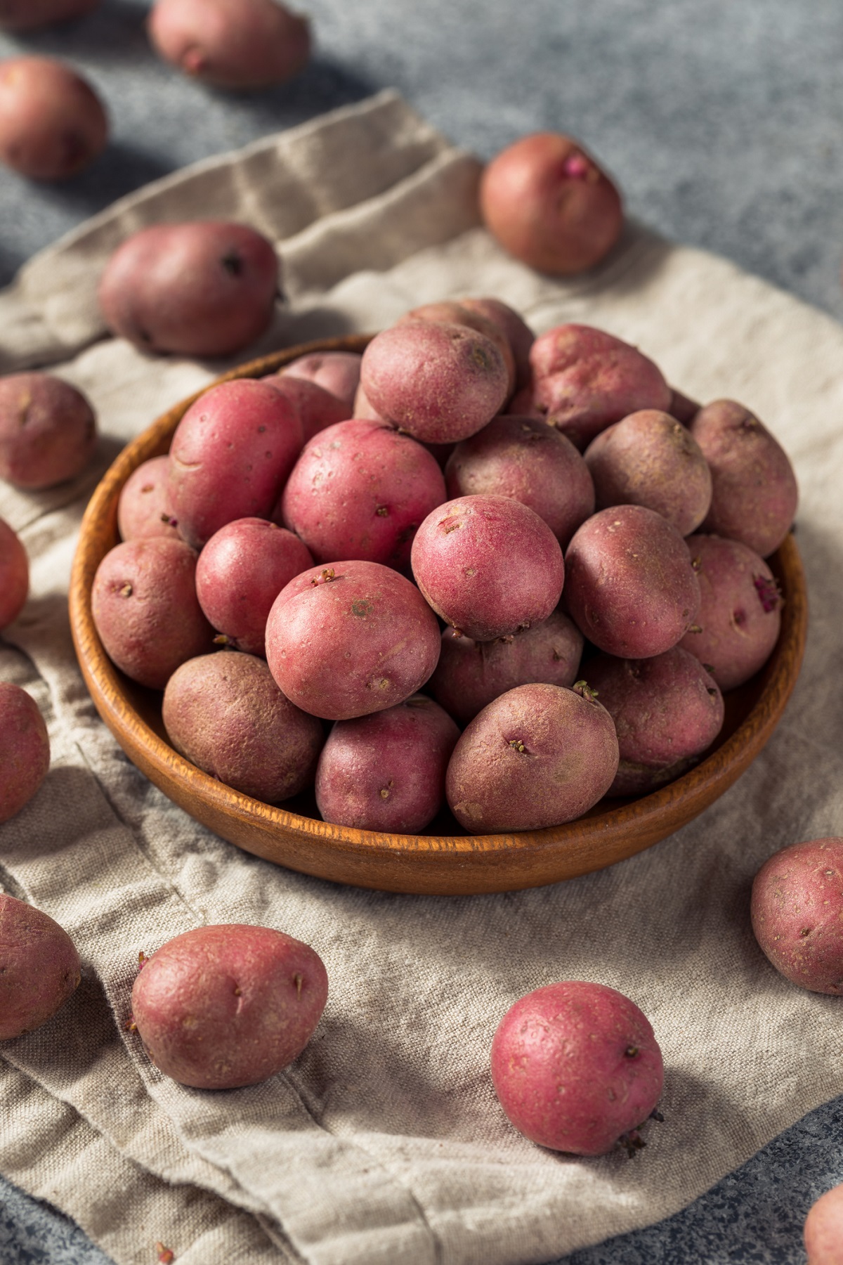 bowl full of raw red bliss potatoes