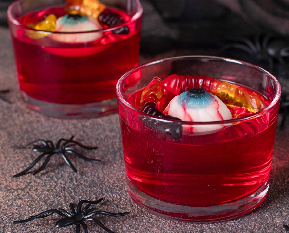 mini glass cups or red Jello garnished with gummy worms and candy eyeballs. A Halloween Dessert.